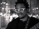 blick bassy sourire